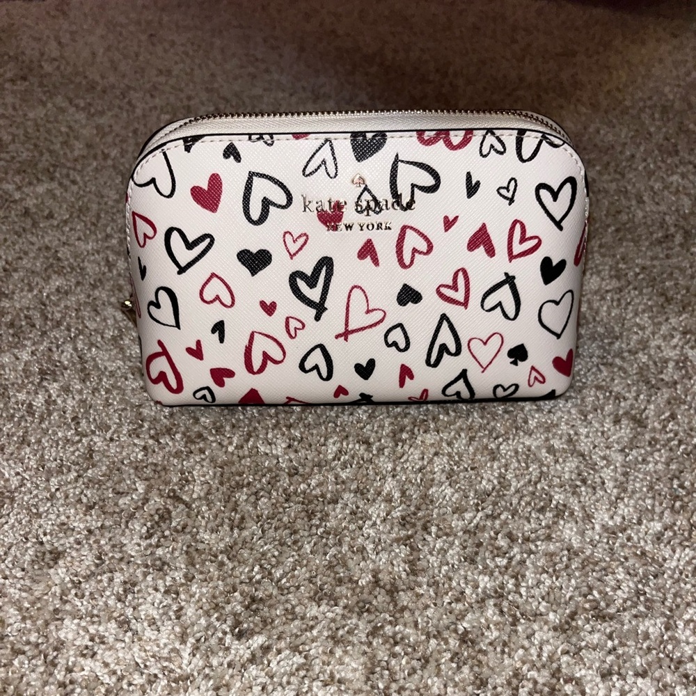 Brand new never used Kate spade heart cosmetic bag